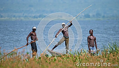 Uganda. Fishermen from the village fishing on the White Nile. Editorial Stock Photo